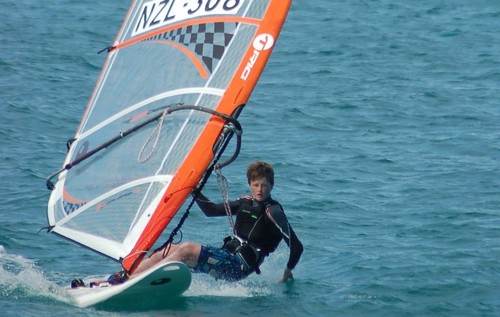 14 year old Murray’s Bay sailor Patrick Haybittle hanging 5 on the way back in after training in Noumea © Brian Haybittle
